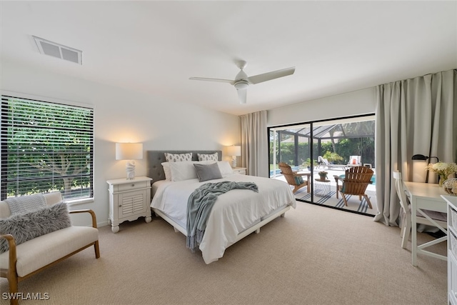 bedroom with access to outside, light carpet, and ceiling fan