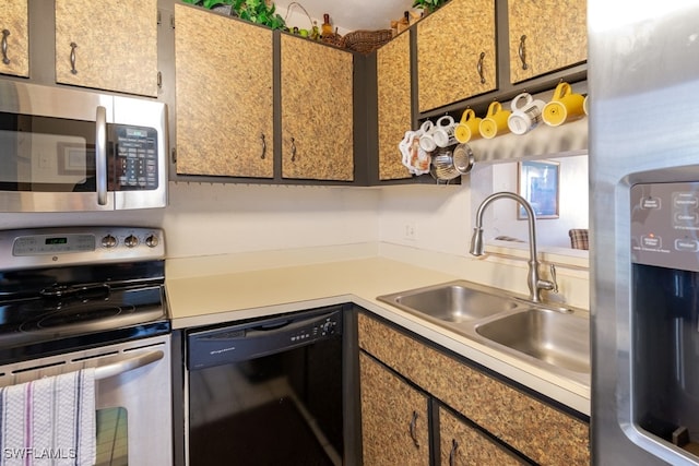 kitchen featuring appliances with stainless steel finishes and sink