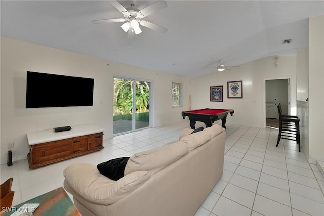 living room featuring lofted ceiling, light tile patterned floors, and billiards