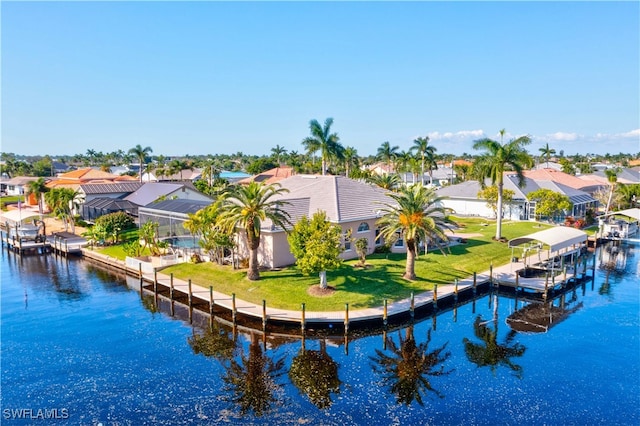 birds eye view of property featuring a water view