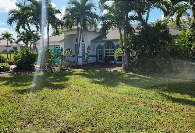 exterior space featuring a front yard