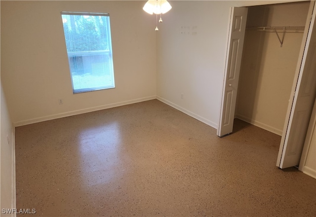 unfurnished bedroom with a closet