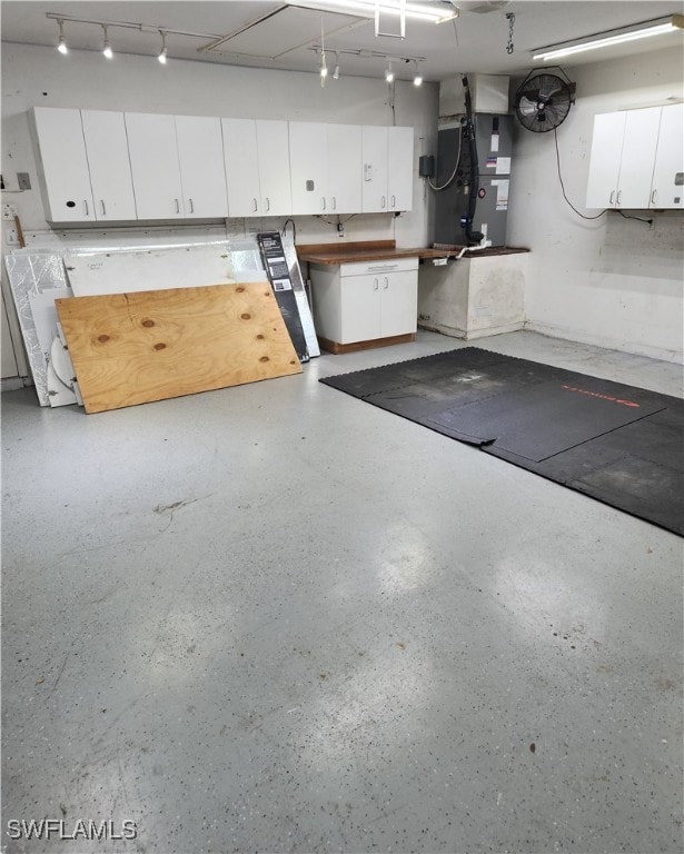 garage featuring heating unit