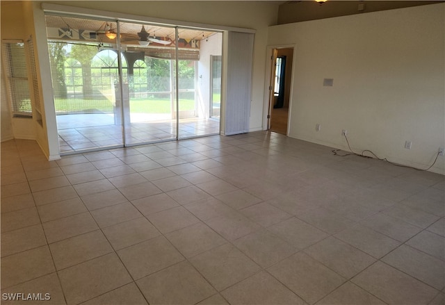 empty room with light tile patterned floors