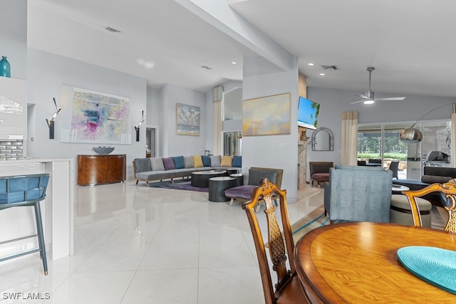 dining room with ceiling fan and light tile patterned floors