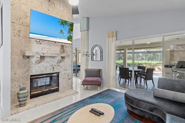 tiled living room with a fireplace