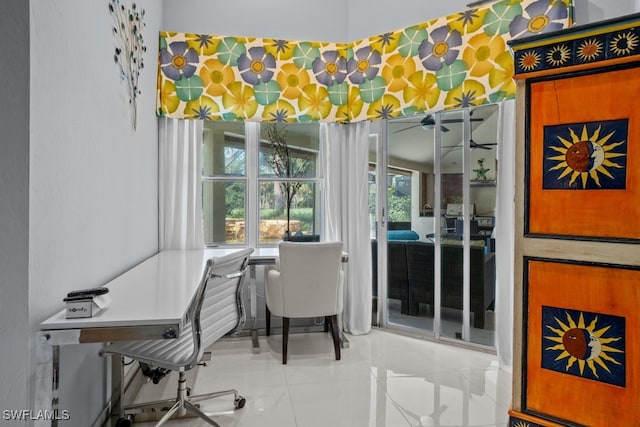 home office with tile patterned floors