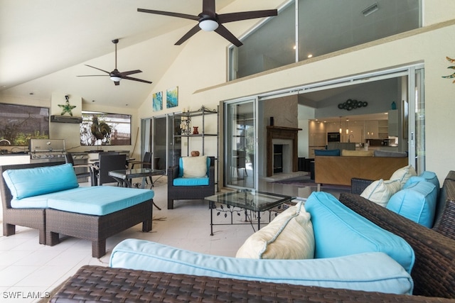 view of patio featuring ceiling fan and an outdoor living space