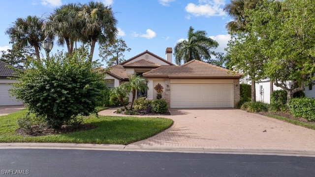 view of front of property featuring a garage