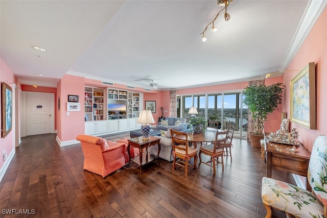 living room featuring dark wood-type flooring, ceiling fan, and crown molding