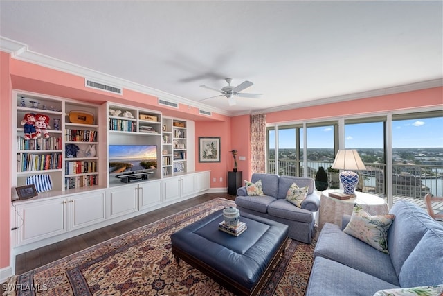 living room featuring dark hardwood / wood-style floors, ceiling fan, and crown molding