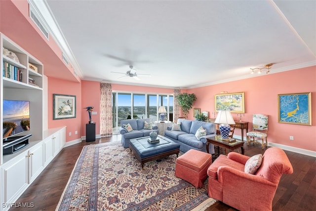 living room featuring dark hardwood / wood-style floors, ceiling fan, and crown molding