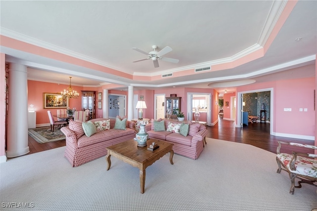 living room with a healthy amount of sunlight, ornate columns, and ornamental molding