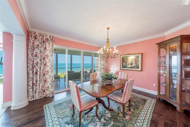 dining space with crown molding, a water view, ornate columns, and dark wood-type flooring