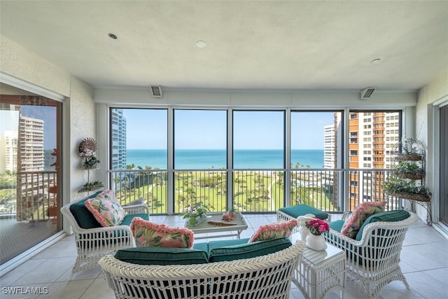 sunroom with a water view