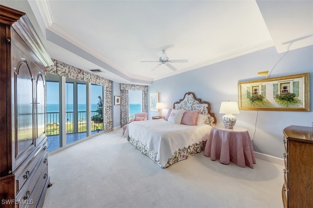 carpeted bedroom with access to exterior, a water view, ceiling fan, and crown molding