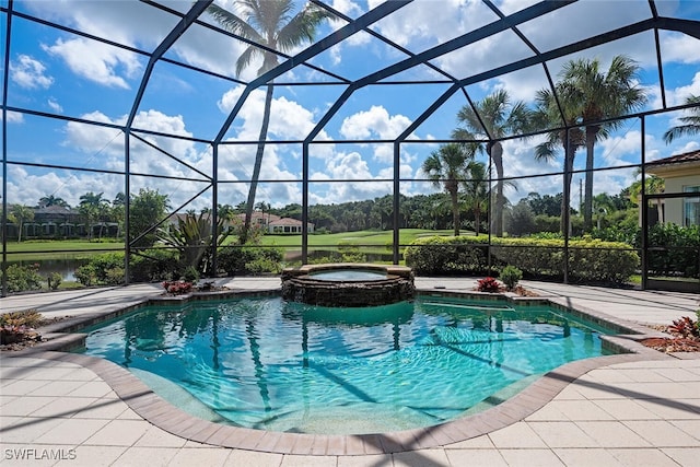 view of swimming pool with glass enclosure and an in ground hot tub