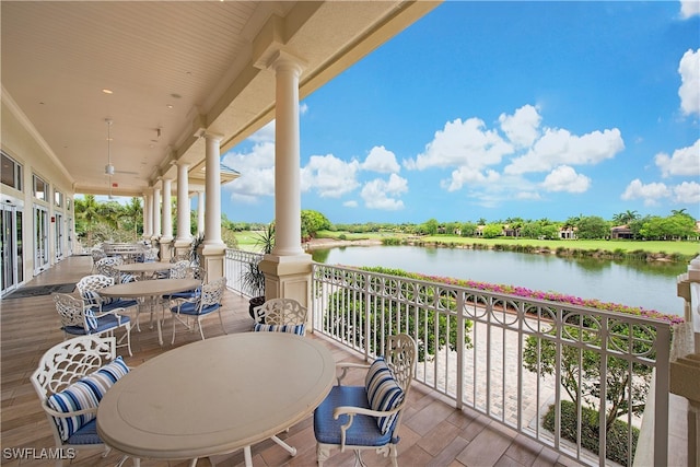 balcony featuring a water view