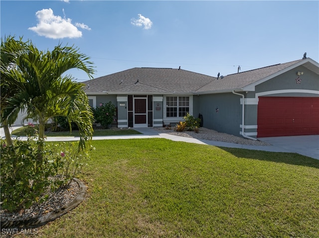 single story home with a front lawn and a garage