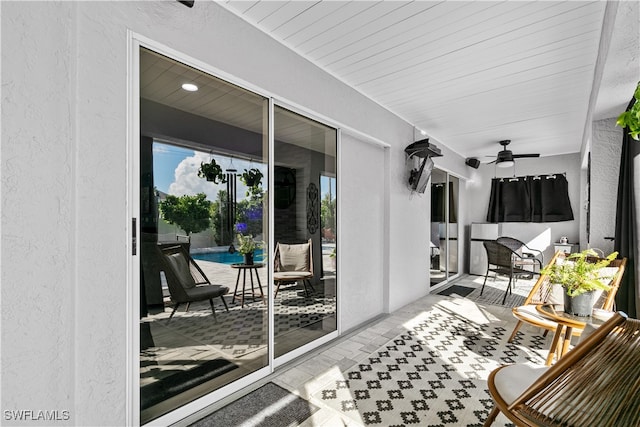 view of patio / terrace featuring ceiling fan