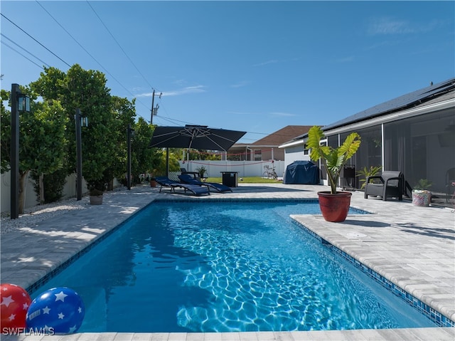 view of pool with a patio