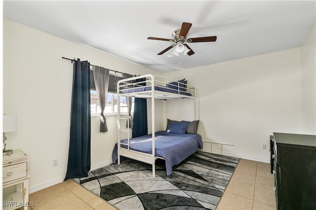 bedroom with light tile patterned flooring and ceiling fan