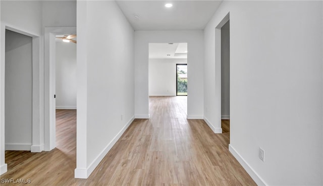 corridor featuring light hardwood / wood-style flooring