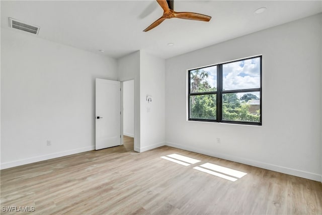 unfurnished bedroom featuring ceiling fan and light wood-type flooring