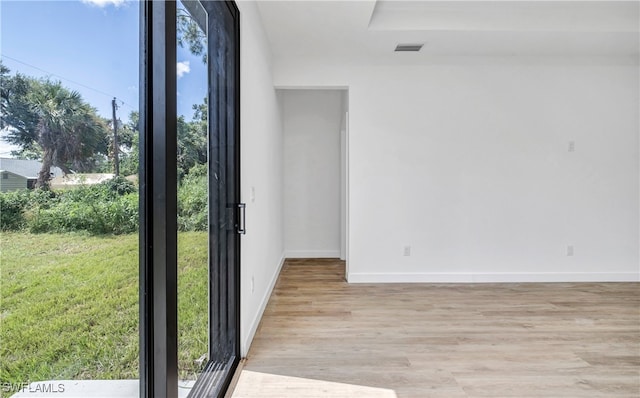 interior space with plenty of natural light and light wood-type flooring