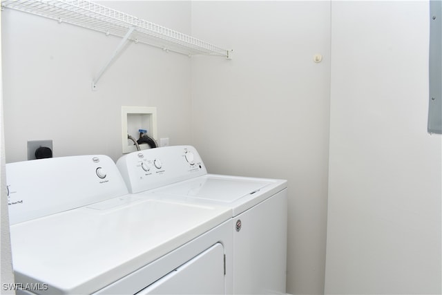 washroom featuring washer and dryer