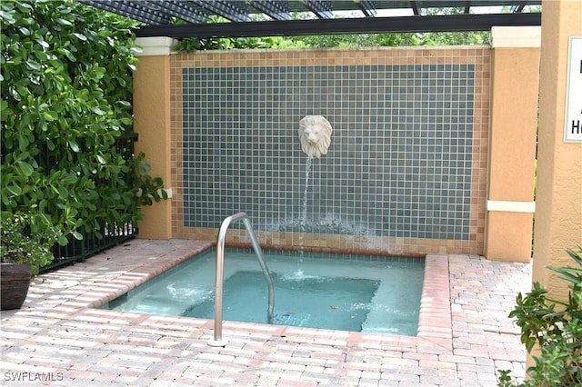 view of swimming pool featuring an outdoor structure