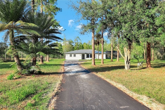 view of front facade with a front yard