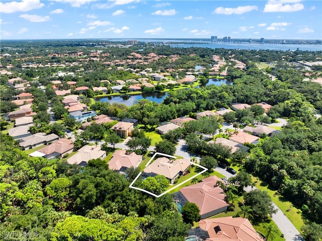 drone / aerial view with a water view