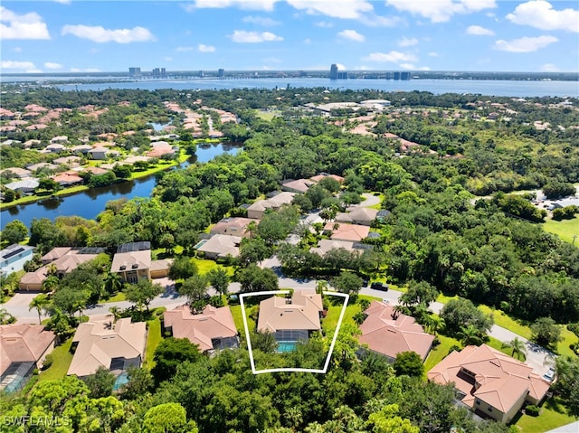 12969 Turtle Cove Trl, North Fort Myers, FL 33903 - aerial perspective of suburban area with property parcel outlined and a nearby body of water
