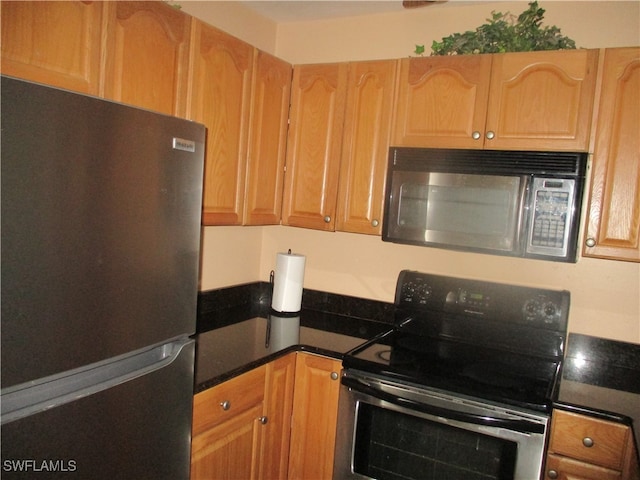 kitchen with black appliances