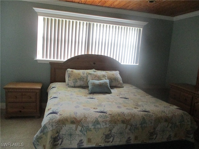 carpeted bedroom featuring wood ceiling and crown molding