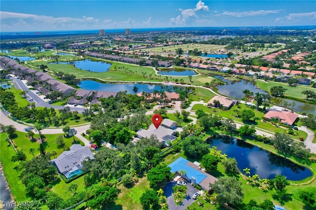 bird's eye view with a water view