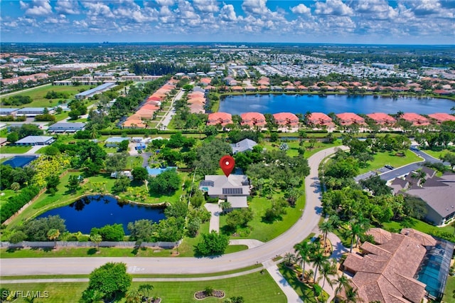 bird's eye view with a water view