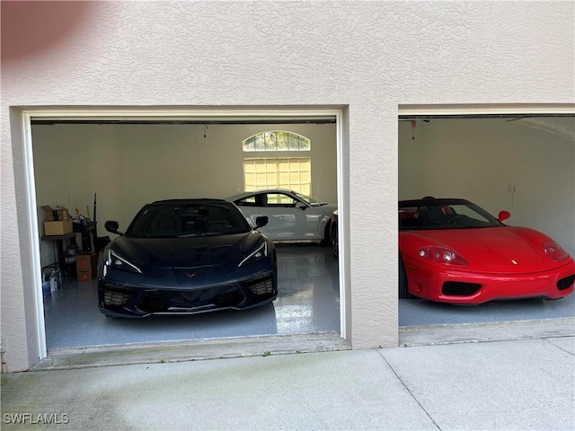 garage featuring a carport