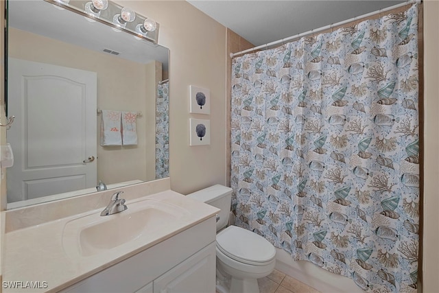 full bathroom with shower / bath combo, tile patterned flooring, vanity, and toilet