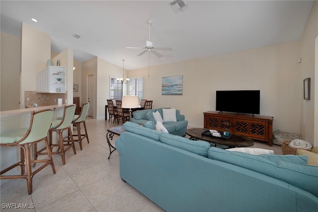 living room with light tile patterned floors, lofted ceiling, and ceiling fan