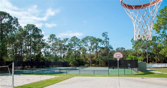 exterior space with tennis court