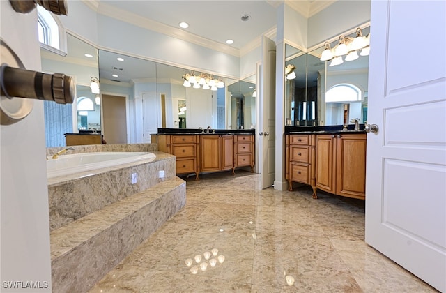 bathroom featuring vanity, ornamental molding, and tiled tub