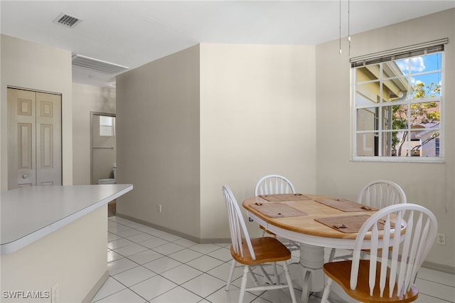 view of tiled dining space