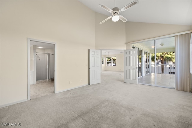 unfurnished bedroom featuring high vaulted ceiling, ceiling fan, light colored carpet, and access to exterior