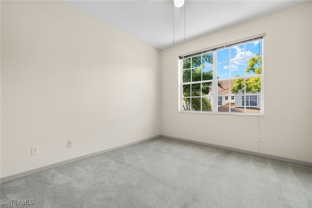 empty room with light colored carpet