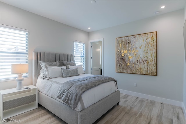 bedroom featuring hardwood / wood-style flooring