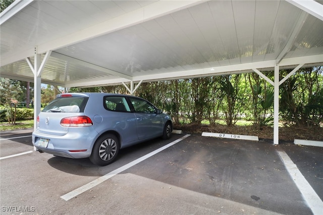 view of parking with a carport