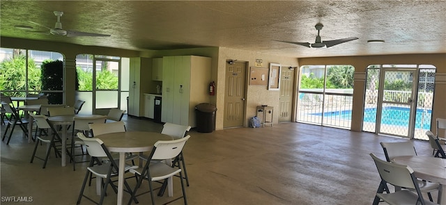 dining area featuring plenty of natural light and ceiling fan