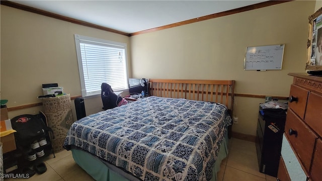 bedroom featuring light tile patterned flooring and crown molding